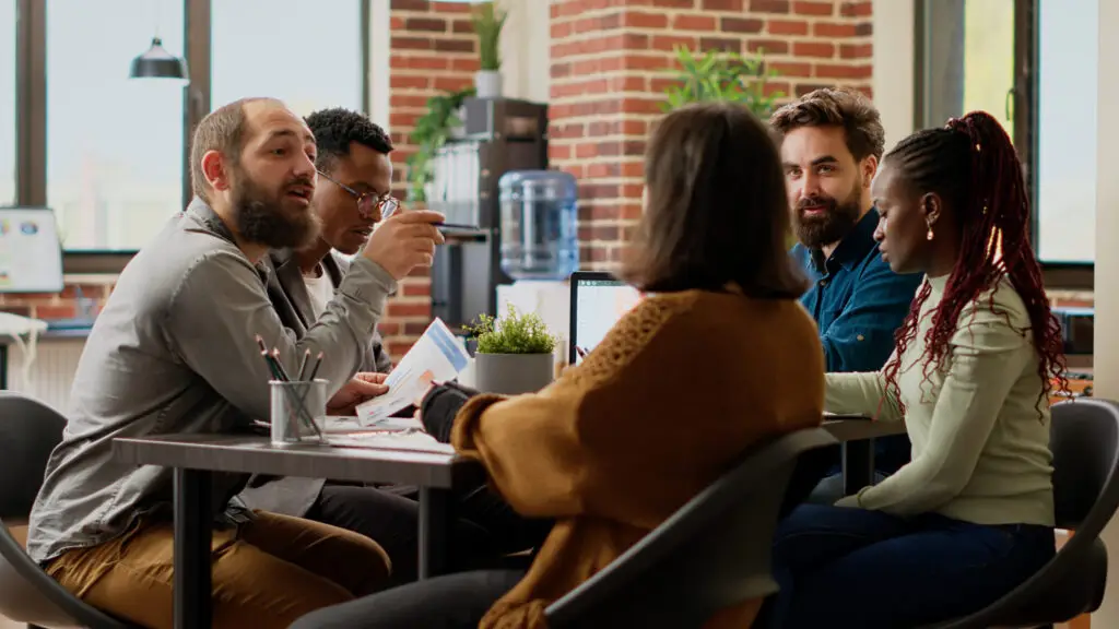 diverse group of coworkers planning startup project in boardroom